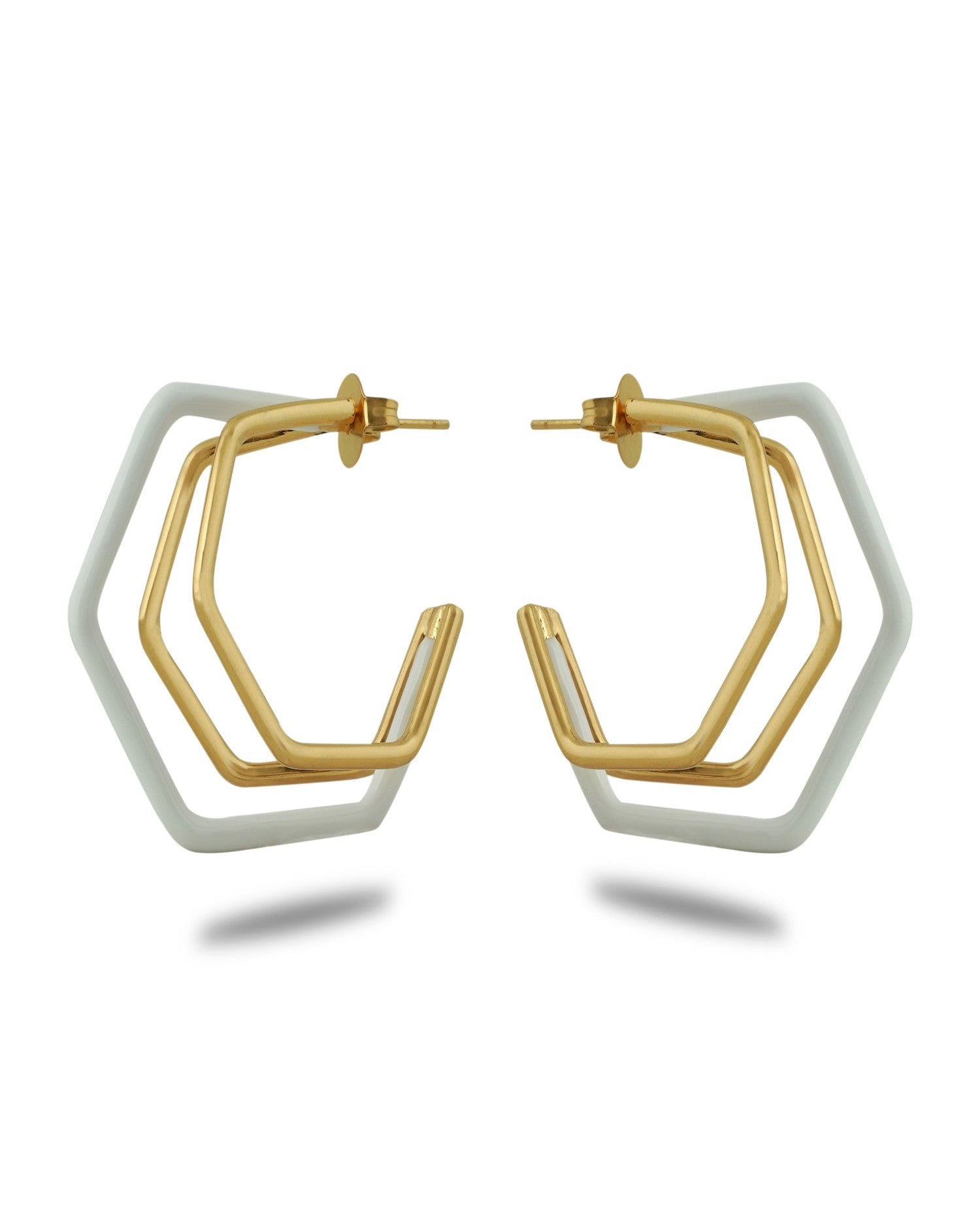 Small white enamel hoop earrings by Varnika Arora, featuring a trio of delicate, round hoops with a glossy enamel finish. Main image