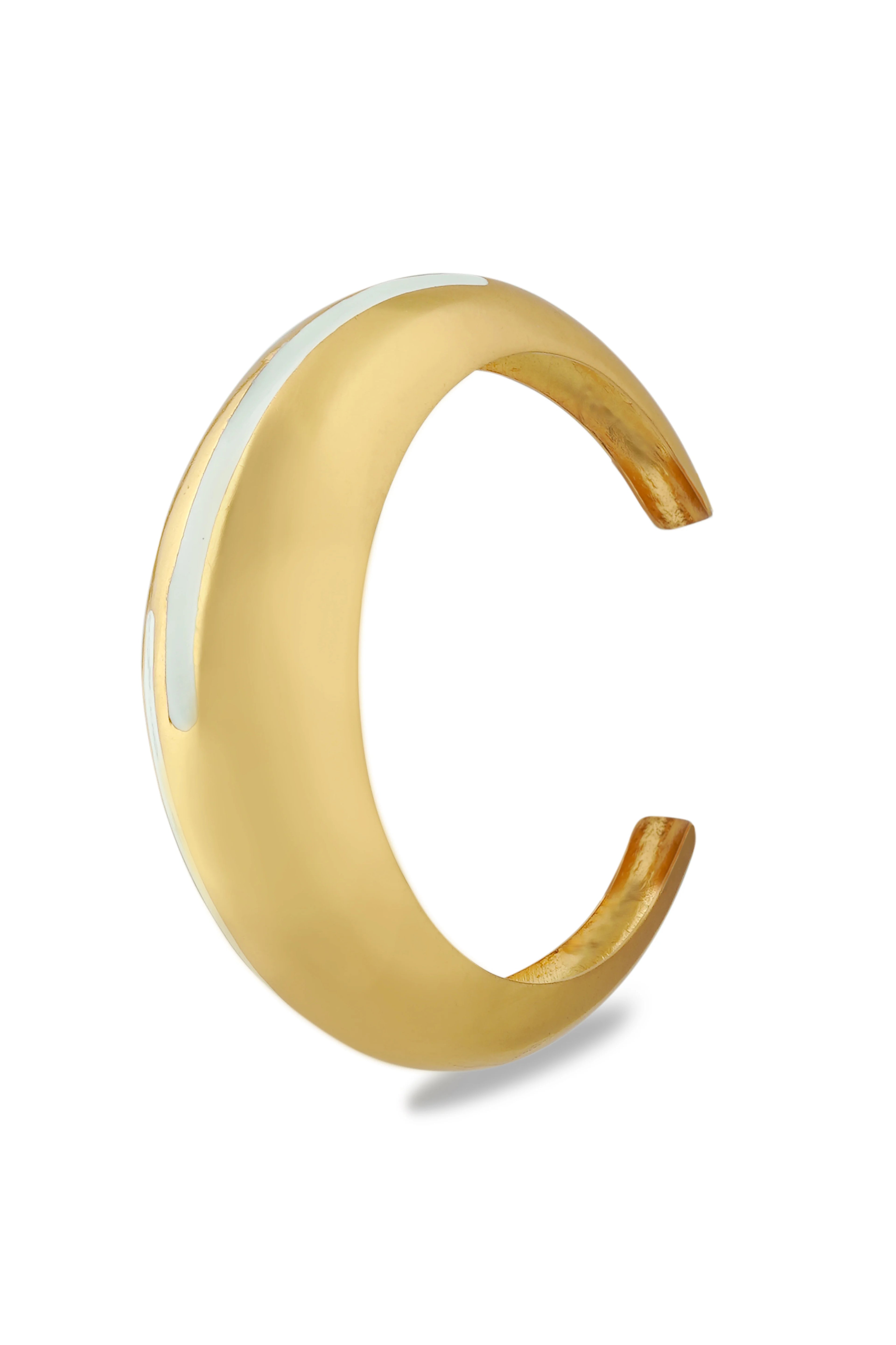 Varnika Arora white enamel and gold bangle with intricate circlet design, showcasing elegant jewelry craftsmanship.