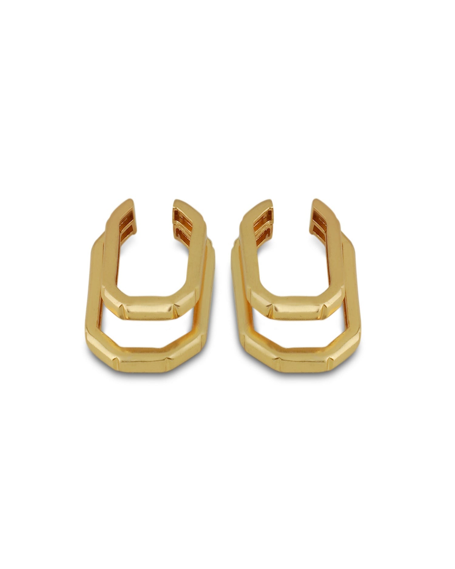 Varnika Arora ellipse gold earrings with smooth, polished finish and elegant oval shape, displayed on a neutral background. Main image