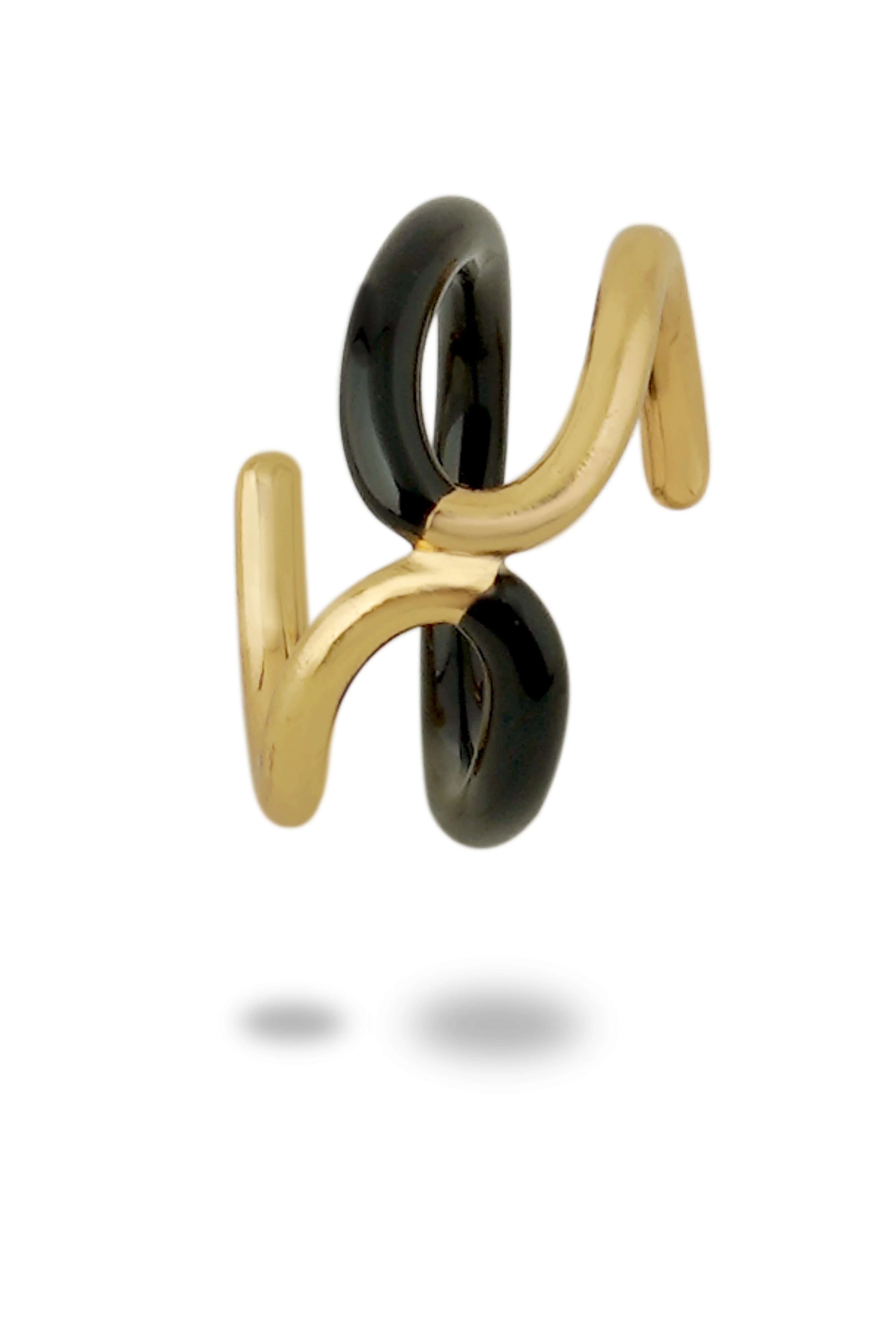 Varnika Arora Sara Ali Khan Twistie 2-way black enamel ring showcasing a stylish, dual-tone design on a sleek ring band.