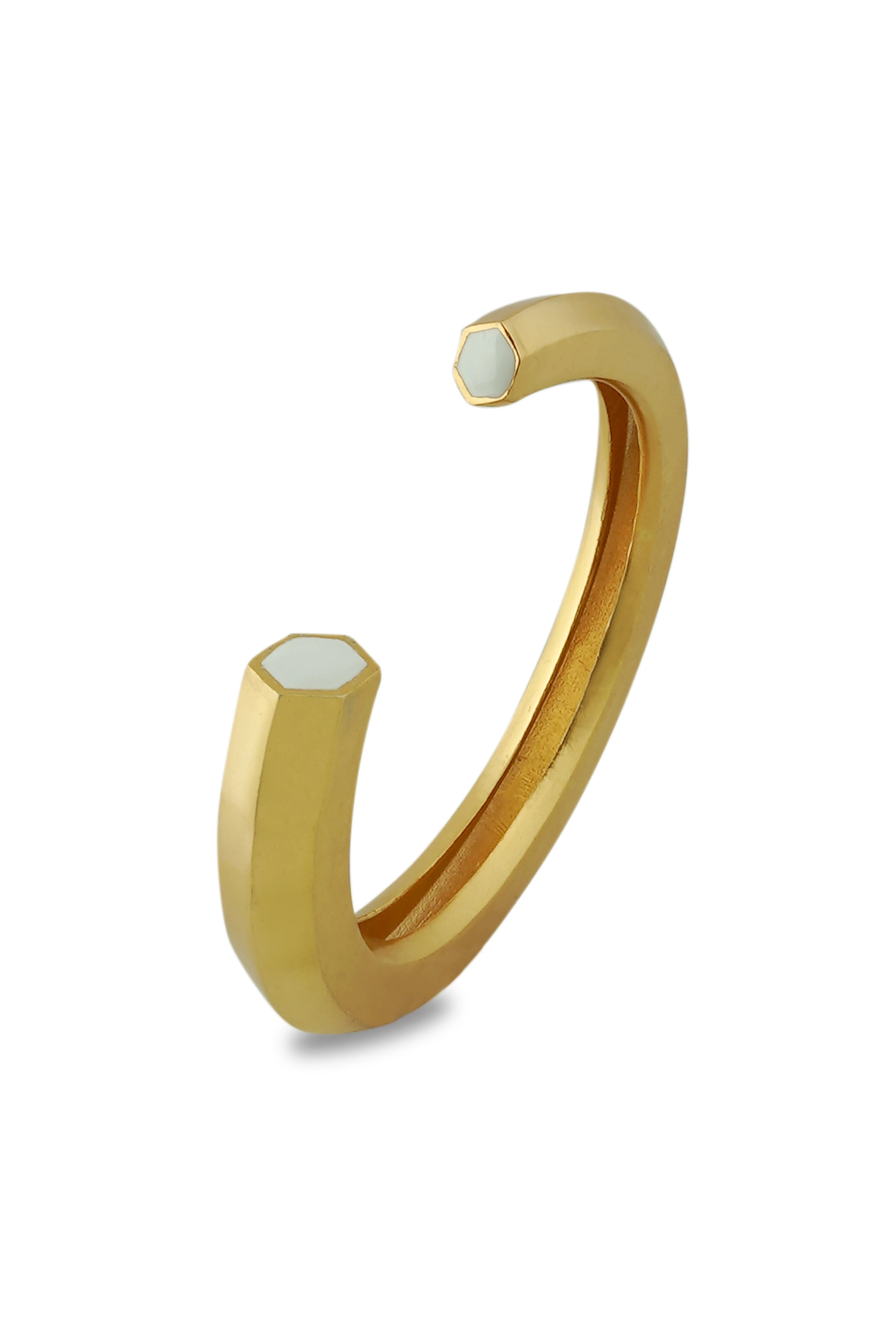 Varnika Arora Hexa White Enamel Gold Bangle Cuff with geometric design and polished finish, showcasing elegant jewelry craftsmanship.