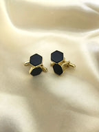 Black Onyx cufflinks by VARNIKA ARORA, elegant men's jewelry featuring polished black onyx stones and silver-tone settings.