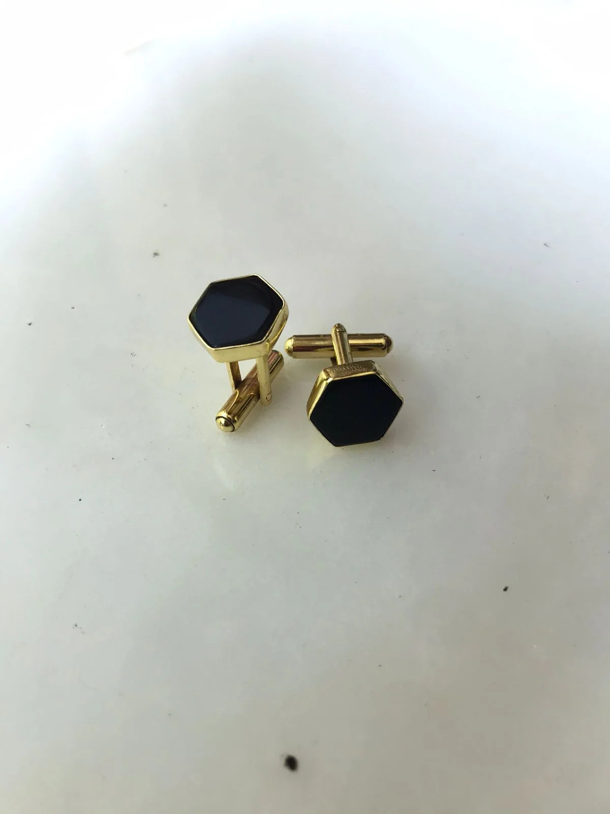 Black Onyx cufflinks by Varnika Arora, elegant jewelry accessory with polished black stone and silver-tone setting.