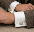 Prehnite cufflinks by VARNIKA ARORA featuring polished green gemstone jewelry with silver-tone metal accents.