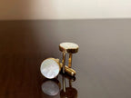 VARNIKA ARORA MOP cufflinks in jewelry, featuring polished blue and white mother of pearl in a sleek, elegant design.