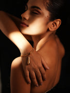 Varnika Arora Pure Motion bracelet featuring sleek silver design with delicate chain and minimalist aesthetic.