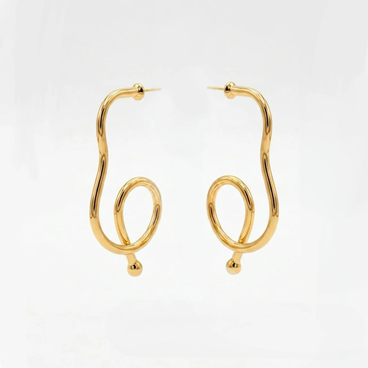 Varnika Arora Big Drift Hoop earrings featuring large gold hoops with intricate design, stylish jewelry accessory Main image