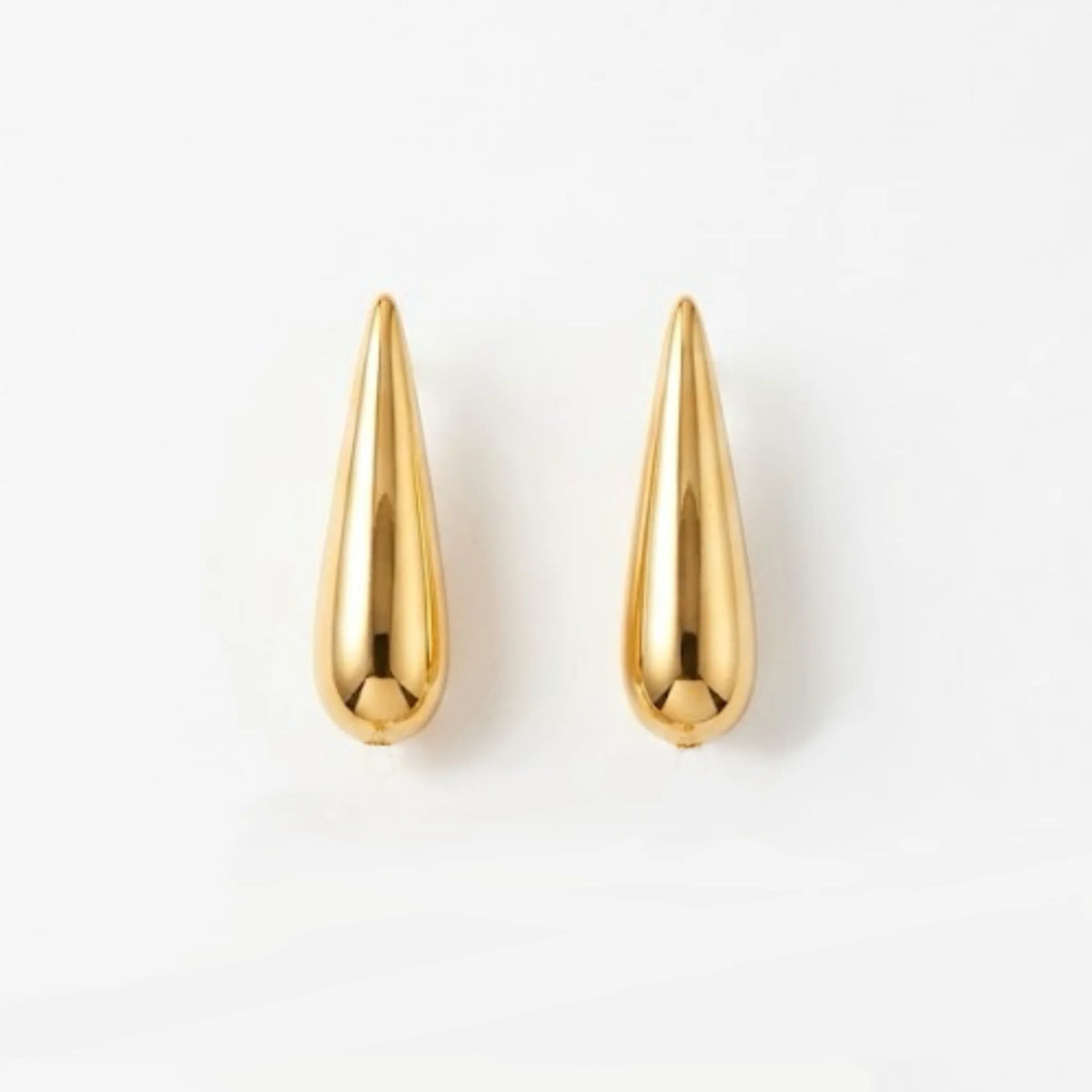 Varnika Arora Still Motion Drop jewelry piece featuring elegant, flowing design with shiny metallic finish. Main image
