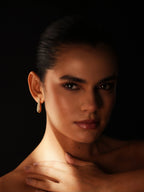 Varnika Arora Still Motion Drop jewelry piece with intricate design and delicate craftsmanship, displayed on a neutral background.