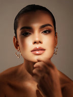 Varnika Arora Flutter studs in gold with intricate design, small hoop earrings for stylish everyday wear