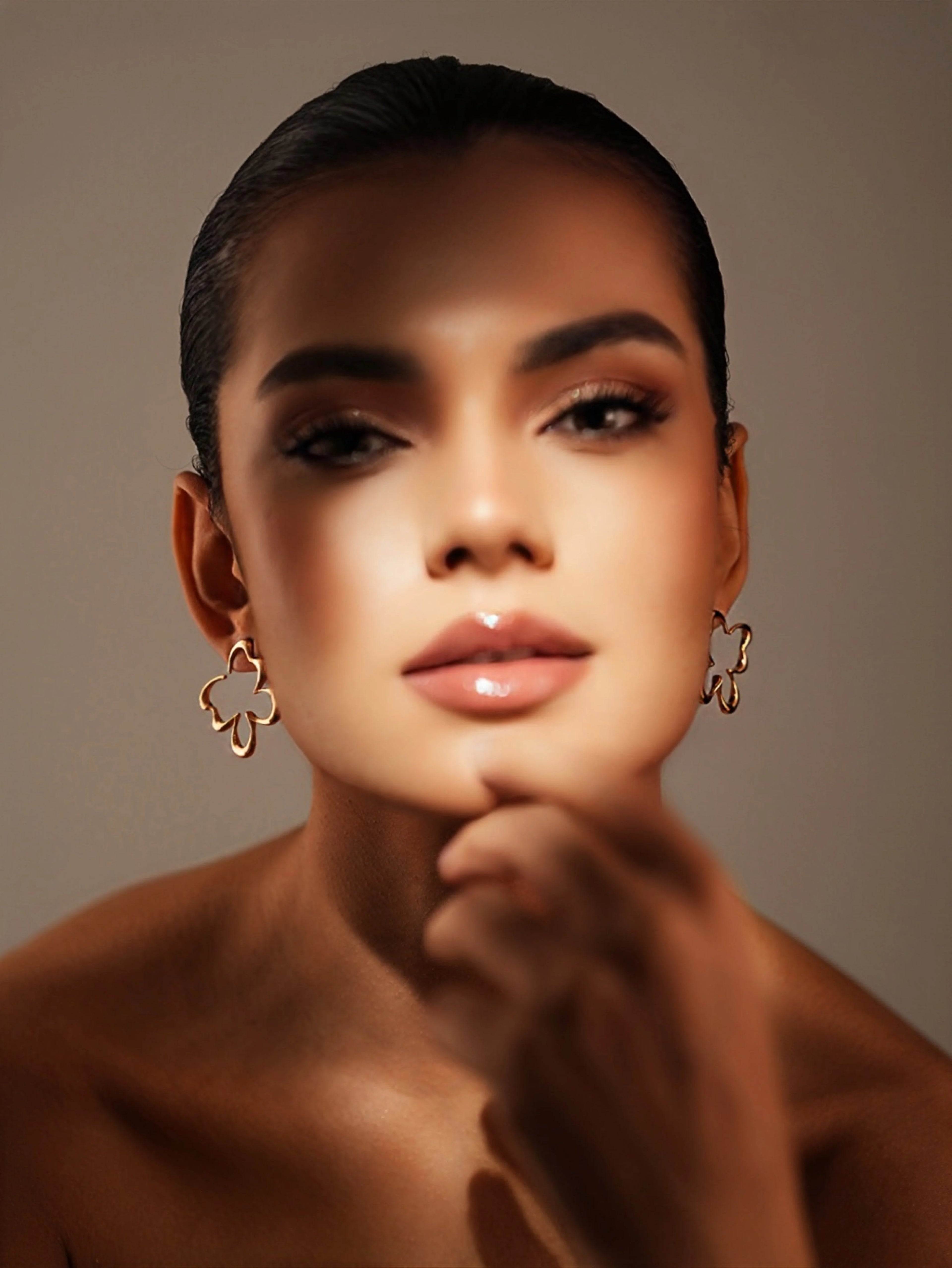 Varnika Arora Flutter studs in gold with intricate design, small hoop earrings for stylish everyday wear
