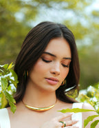 Varnika Arora Aurelia Green Enamel Gold Neckpiece showing intricate gold design with vibrant green enamel accents.