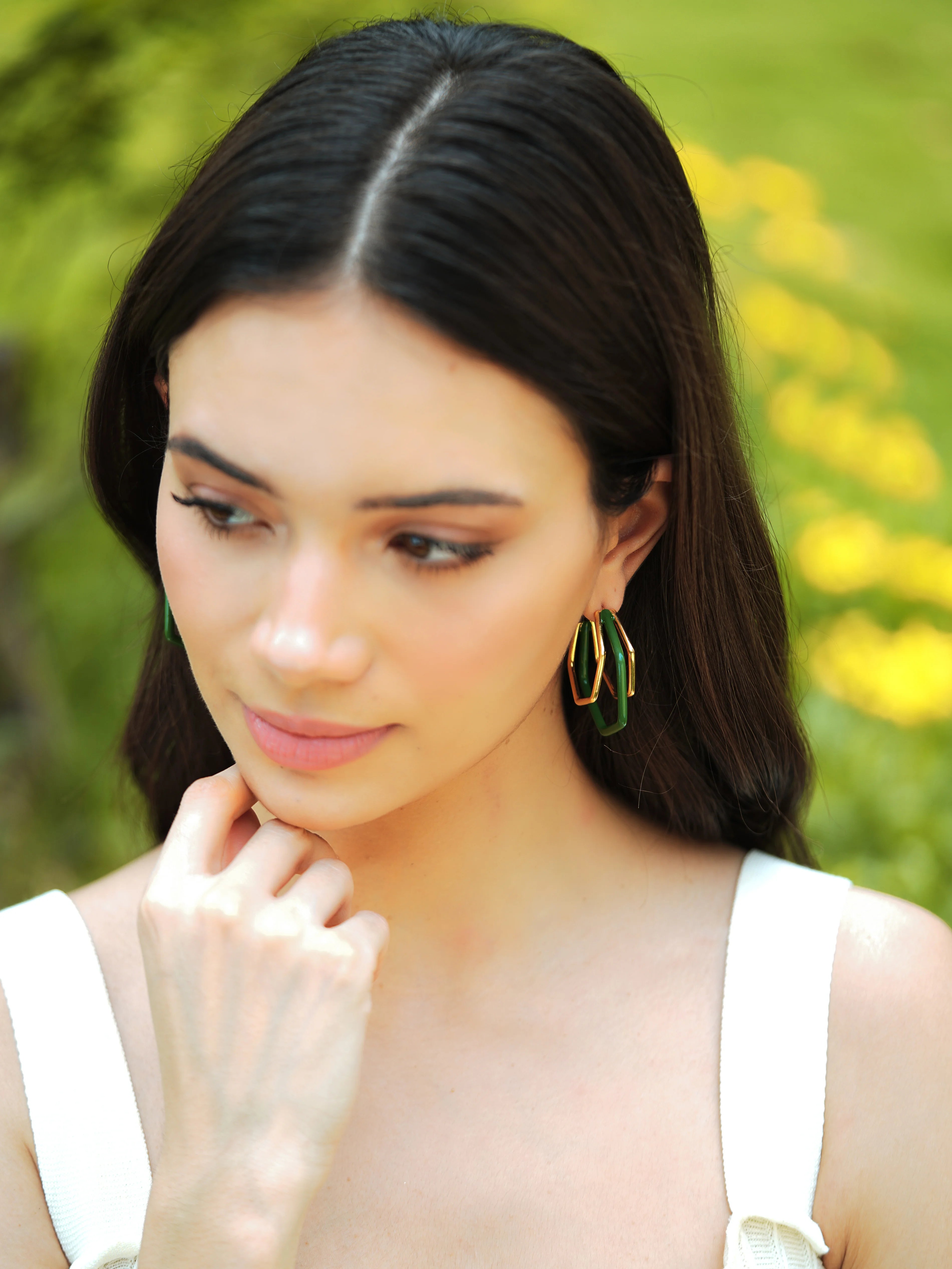 Small trio green enamel gold hoops by Varnika Arora featuring three layered hoop earrings with green enamel accents and gold finish.