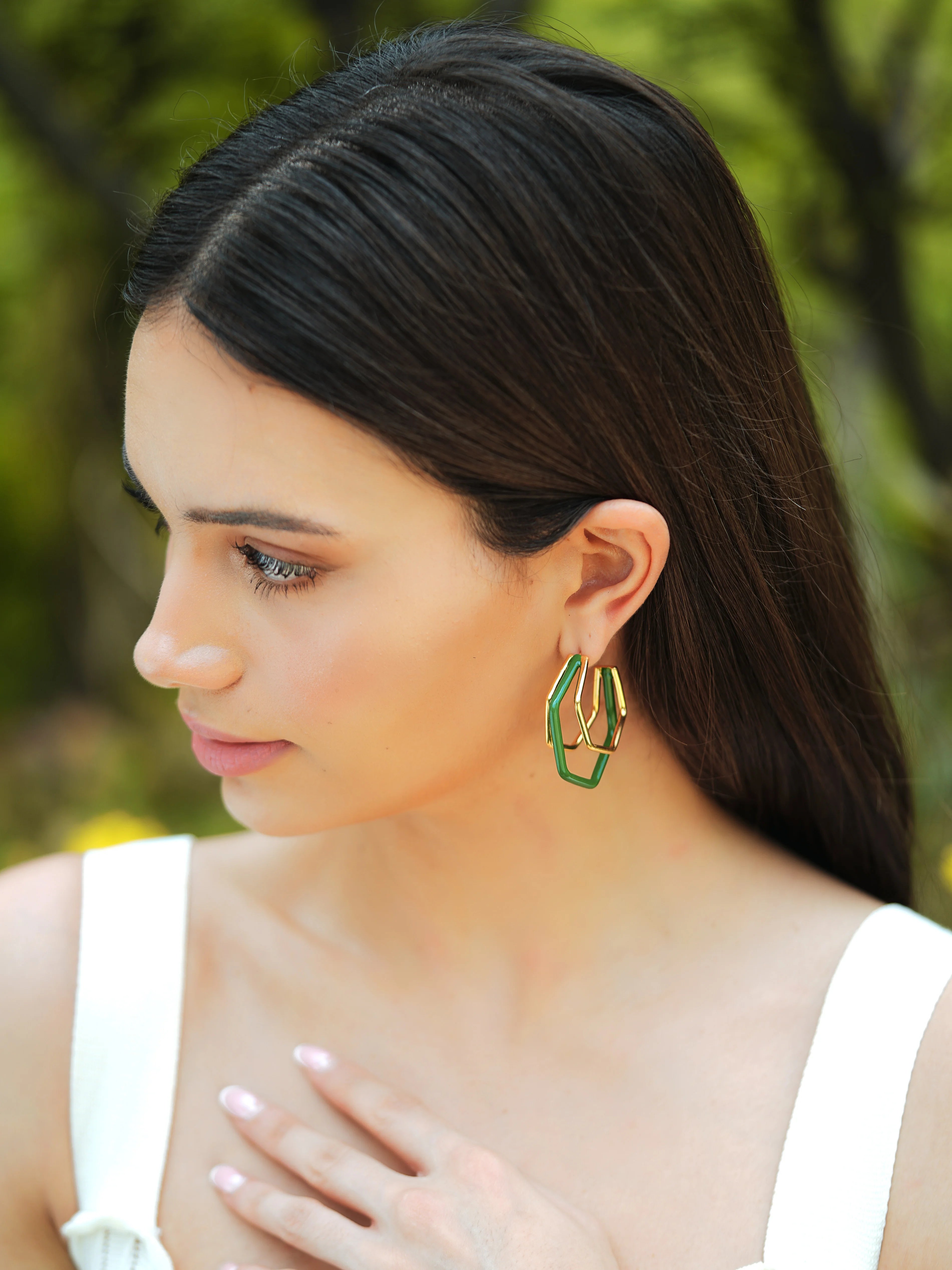 Small trio green enamel gold hoops by Varnika Arora, featuring three delicate hoop earrings with vibrant green enamel accents.