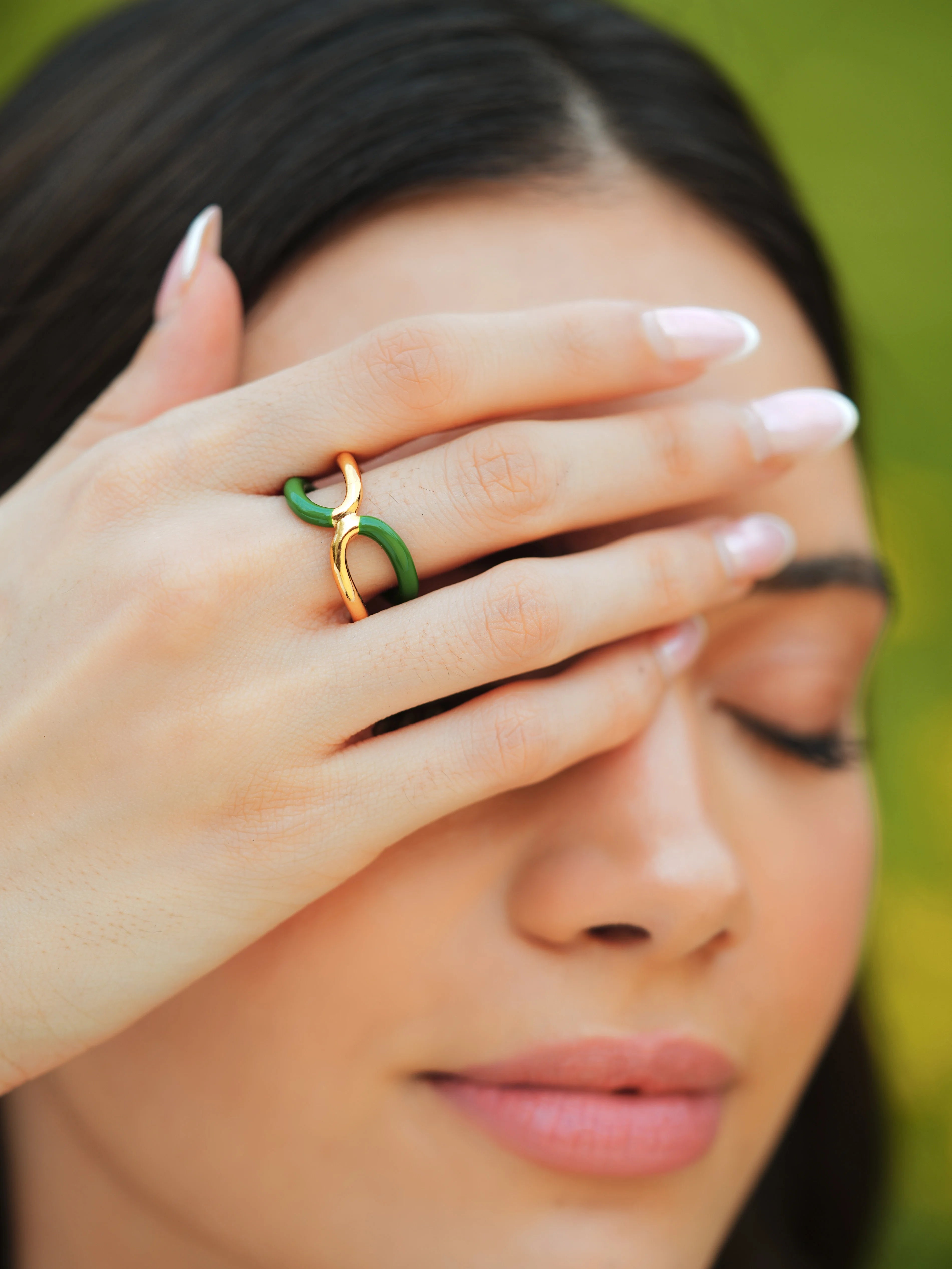 Varnika Arora Twistie 2-way green enamel gold ring featuring a stylish, versatile design with green enamel accents.