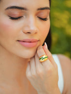 Varnika Arora Verdora green enamel gold ring with intricate design, showcasing vibrant green enamel and polished gold band.