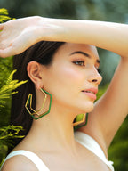 XL Trio green enamel gold hoops by Varnika Arora, showcasing bold, shiny hoop earrings with vibrant green enamel accents.