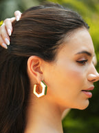 Varnika Arora Helixa Green Enamel Gold Hoops jewelry featuring stylish green enamel accents and gold hoop design.