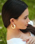 Huma Qureshi in Helixa White Enamel Gold Hoops