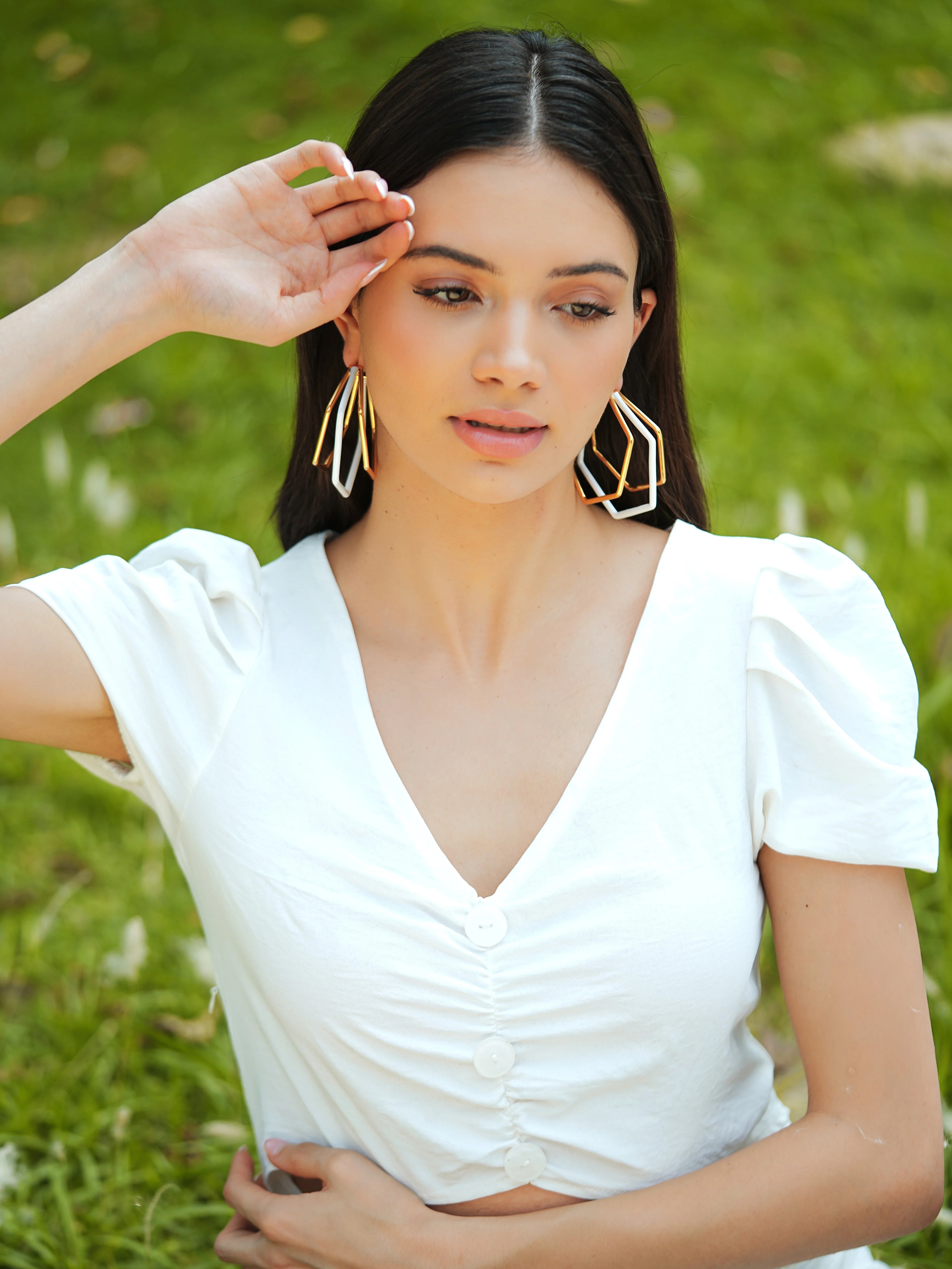XL Trio white enamel gold hoops by Varnika Arora, featuring three large hoop earrings with white enamel and gold finish.