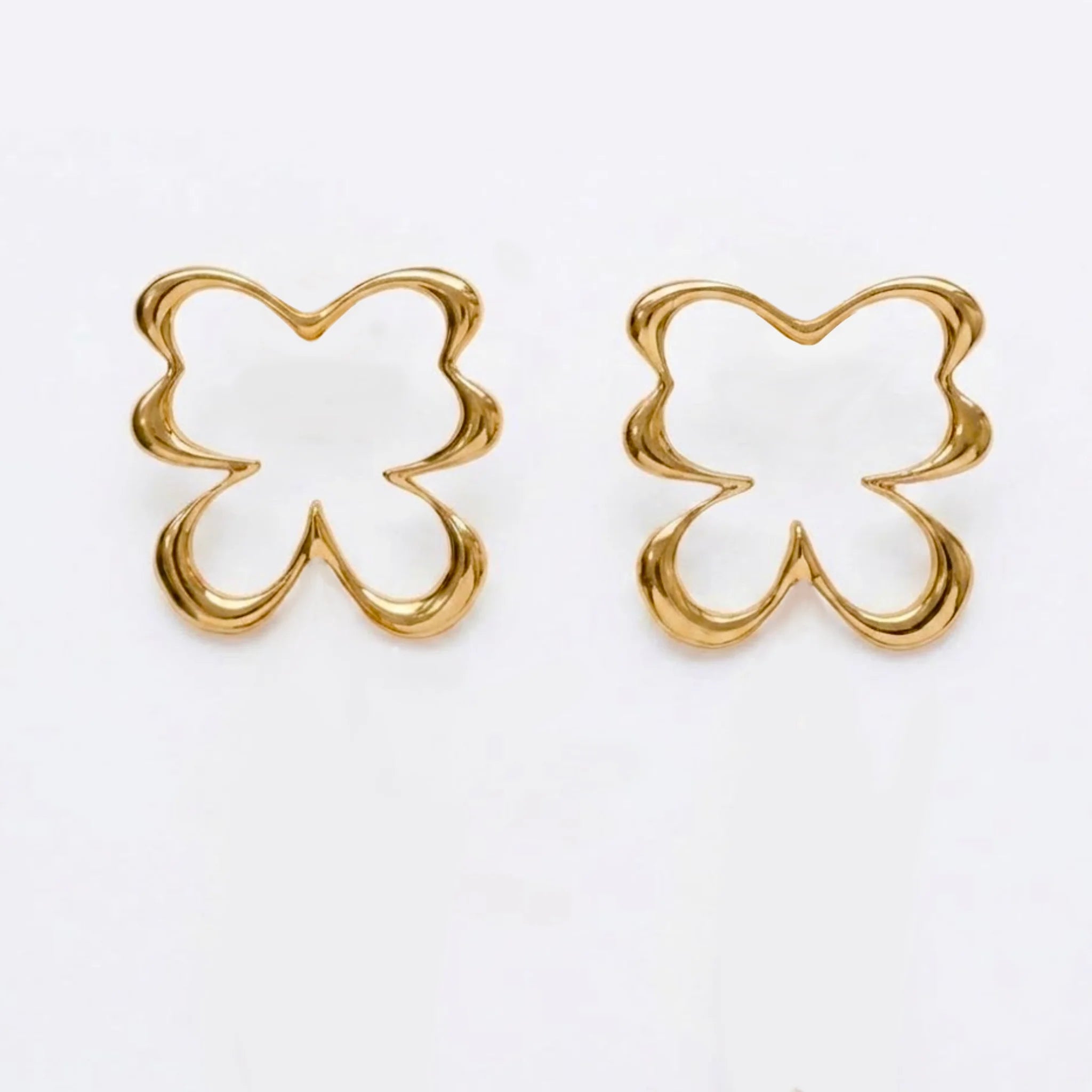 Varnika Arora Flutter studs with intricate design, gold-tone metal, and small sparkling embellishments, perfect for elegant wear