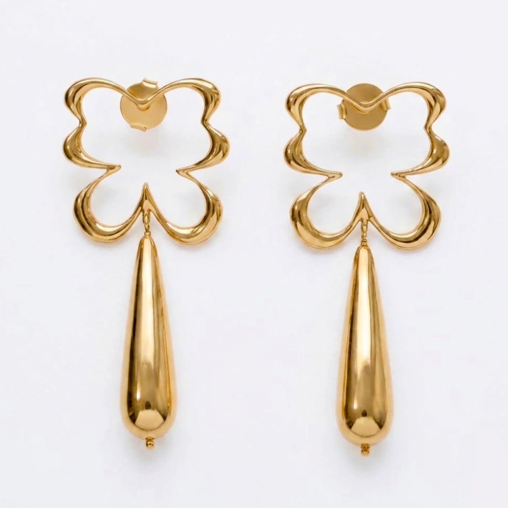 Varnika Arora Bloom Tear Earrings featuring delicate teardrop-shaped design with floral details in silver finish.