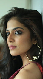 Malavika Monahan in Killer Bee Hoops
