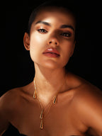 Varnika Arora Dewdrop Necklace featuring a delicate silver chain with teardrop-shaped pendant on a white background