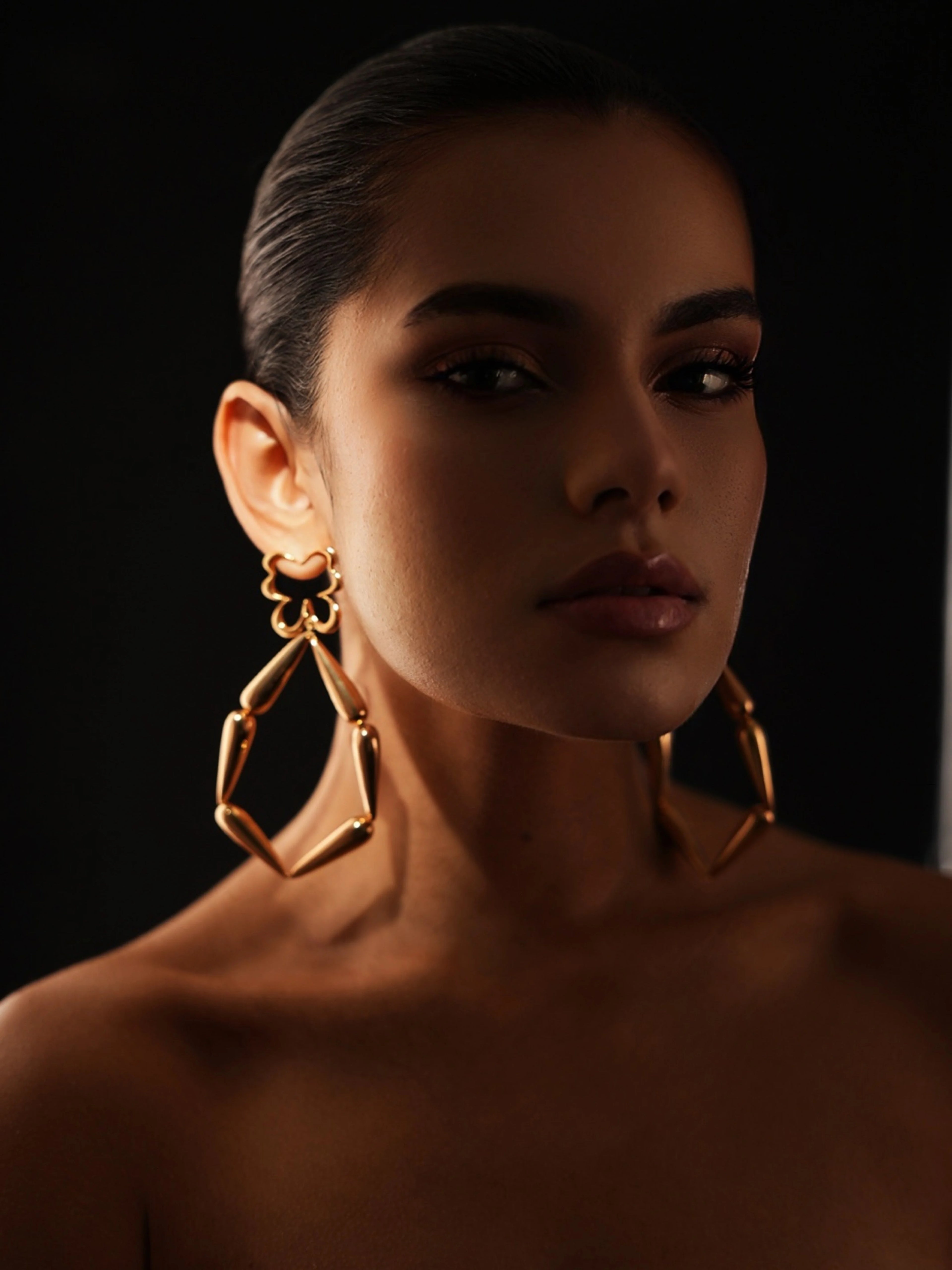 Varnika Arora Pulse Hoop in silver with sleek, modern design, shown close-up on a plain background.