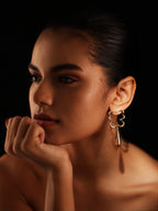 Varnika Arora Bloom Tear Earrings featuring delicate floral-inspired teardrop design in gold-tone metal