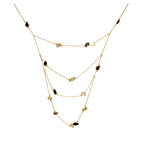 Varnika Arora Steezy Necklace, stylish gold-toned neckpiece with intricate design, displayed on a neutral background
