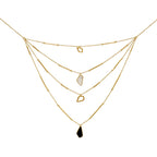 Varnika Arora Trigonic Necklace featuring geometric gold-tone pendant on a delicate chain, elegant jewelry for women