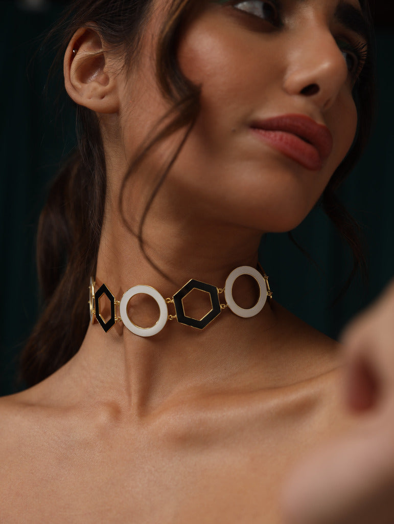 Varnika Arora Deco Drop IVANA jewelry featuring elegant gold drop earrings with intricate detailing and gemstone accents. Main image